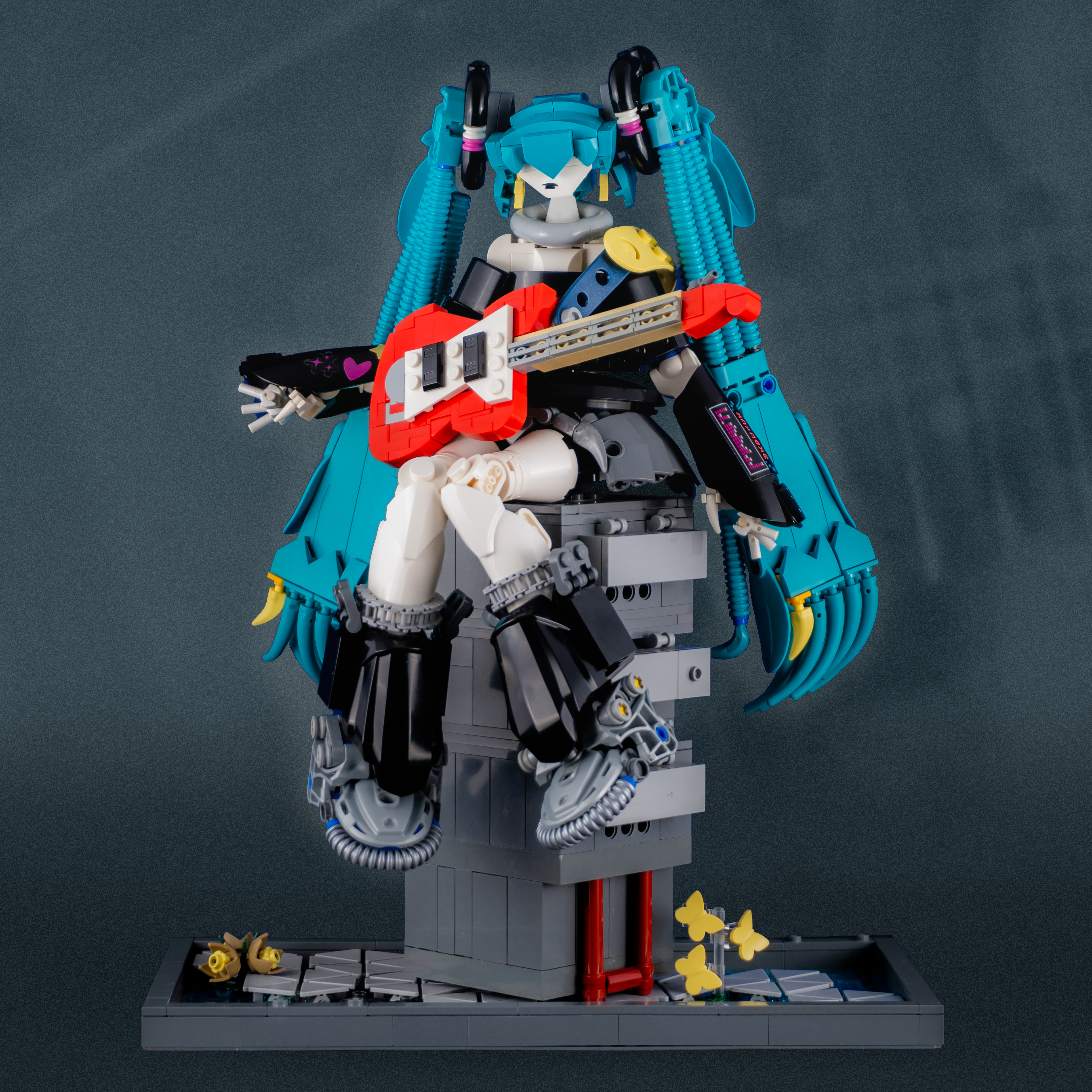 Ubel with base holding guitar