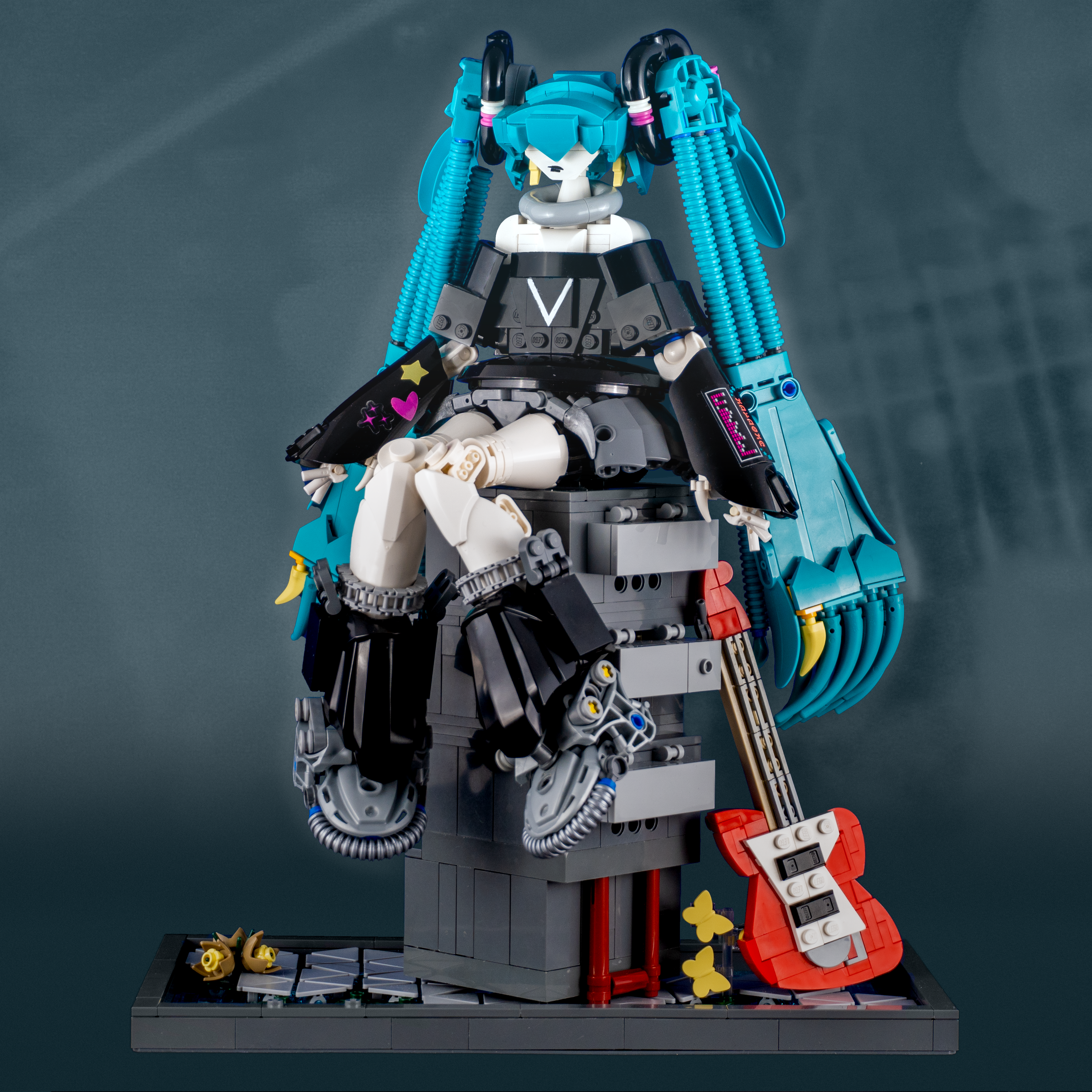 Ubel with base guitar on side