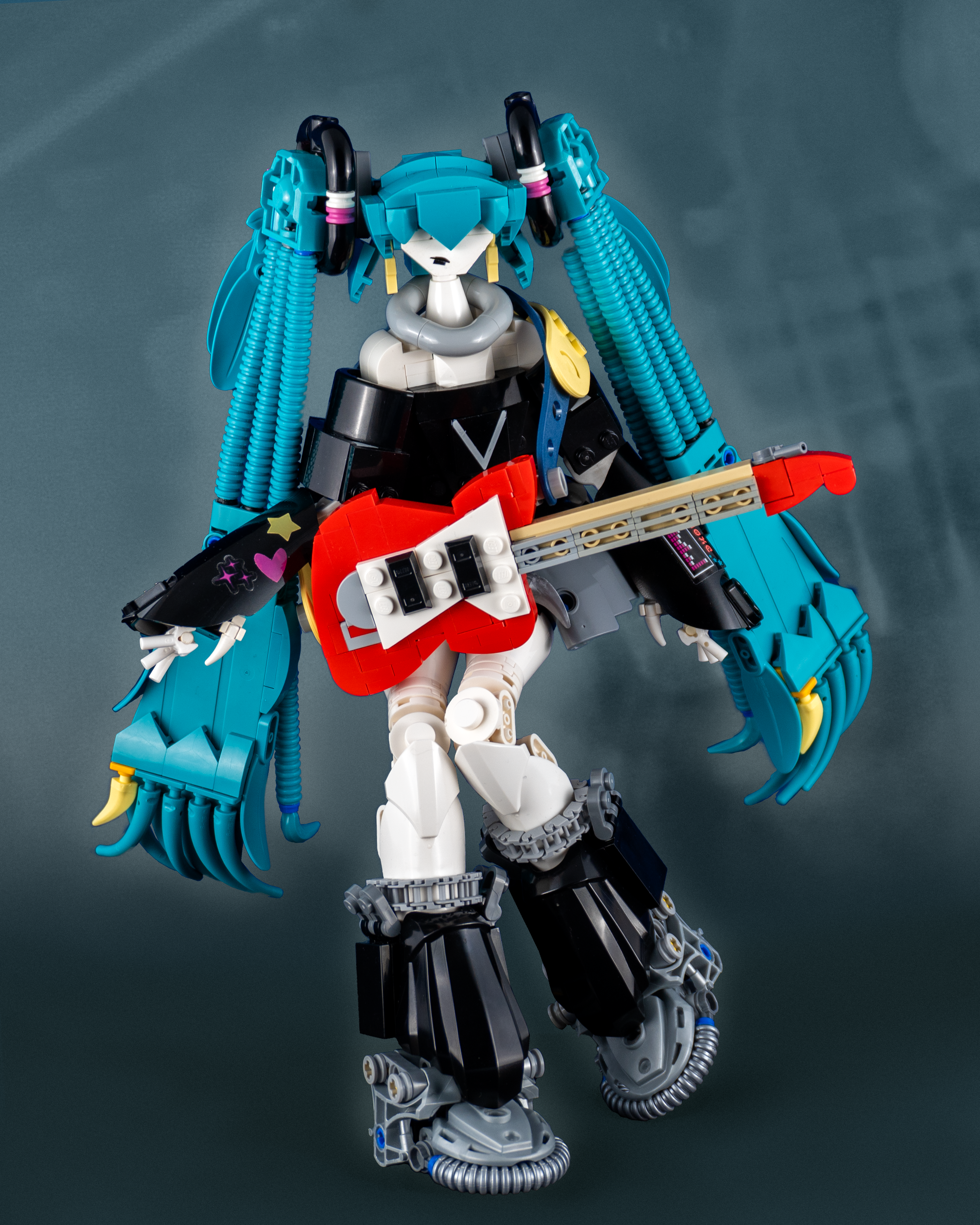 Ubel standing guitar in front